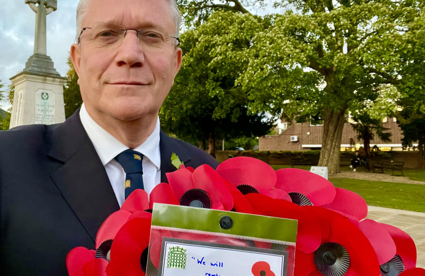 Pictured: Andrew Rosindell M.P. with a Remembrance Day Wreath